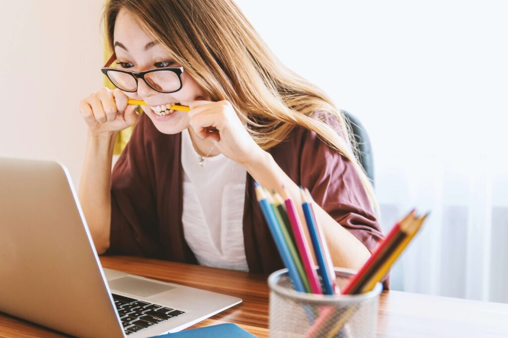 Small business owner deciding on the CRM she'll use for her business